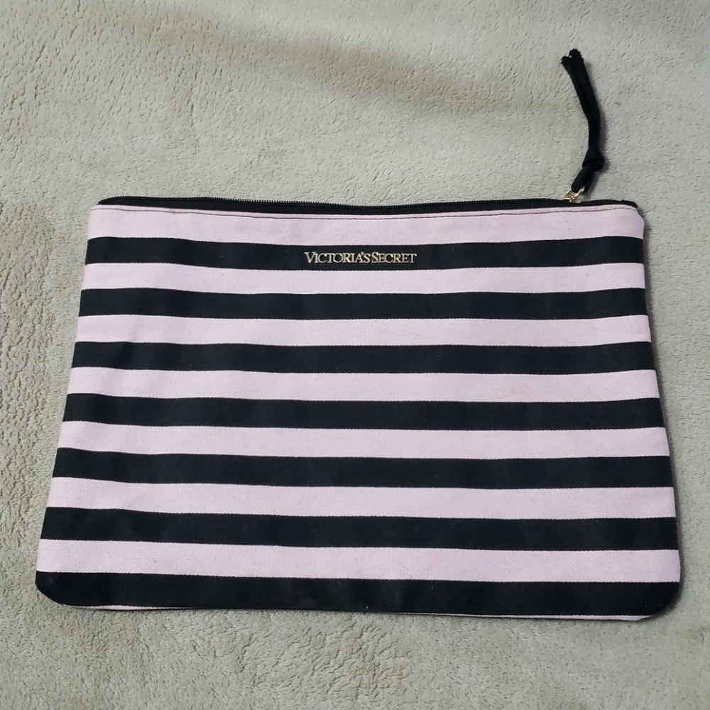 Victoria's secret pink and black bag.